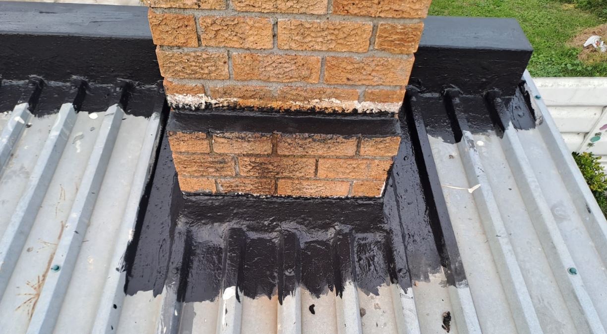 Chimney flashing waterproofed with Silkhan liquid rubber